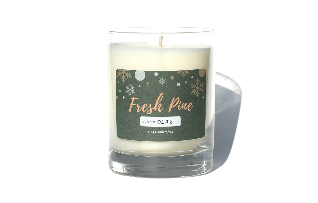 Fresh Pine candle from 6:24 Handcrafted. It smells like Balsam Fir, Vanilla, and other earthy and woodsy fragrances that are suited for the holidays.