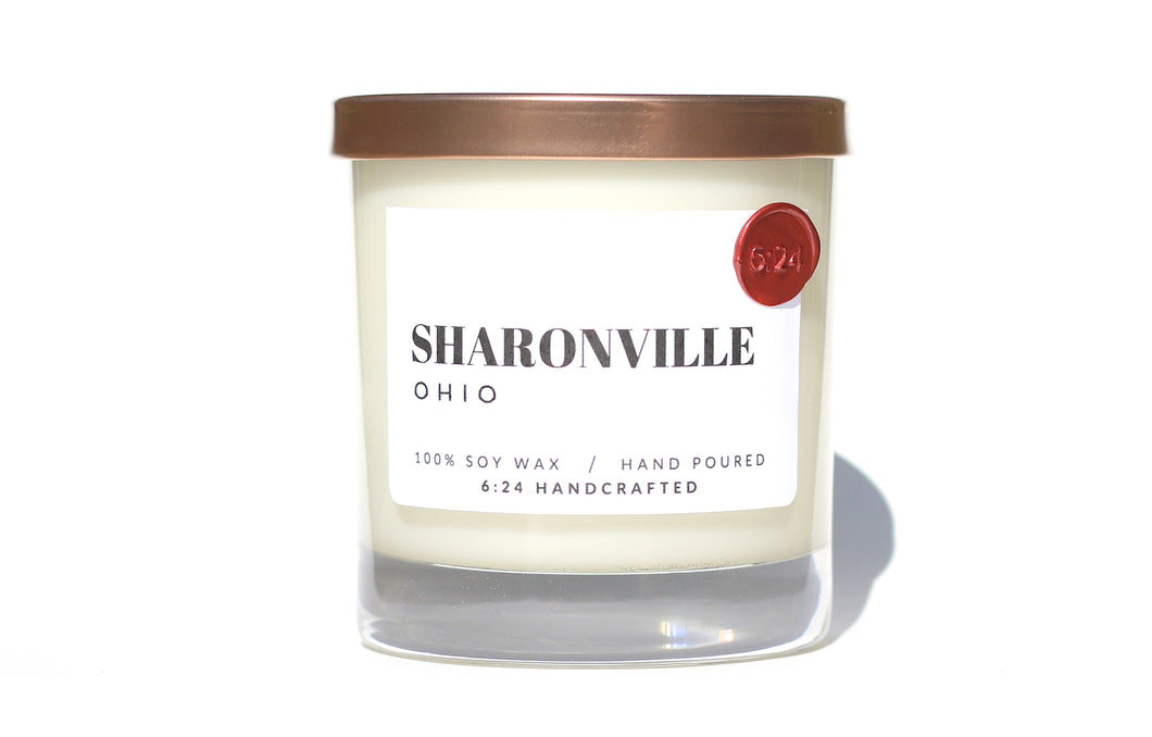 Sharonville, Ohio glass candle made from 6:24 Handcrafted with a white label and a rose gold lid.